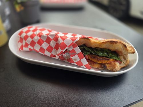 The seasonal veggie, which is filled with harissa squash, beet hummus, spinach and basil at The Dough Works in Exmouth