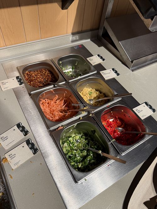 Self service topping station  at Marugame (The Strand) - Japanese Udon Noodles & Tempura in London