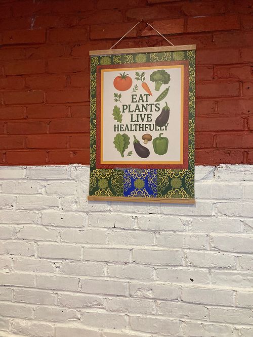 wall art at Himalaya Vegan Organic Restaurant in New York City