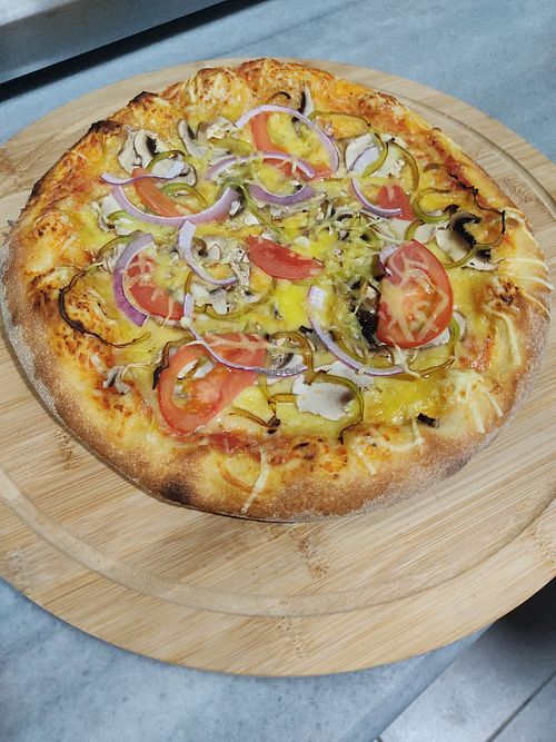 Vegan pizza(onion,mushroom,pepper,tomato) at PizzaStories in Thessaloniki