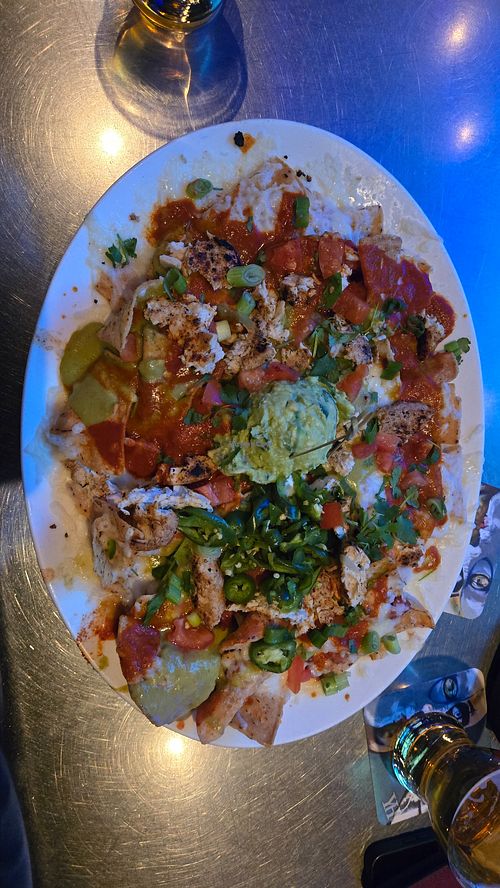 Gardein chicken nachos with vegan cheese, no sour cream at Yard House in Las Vegas