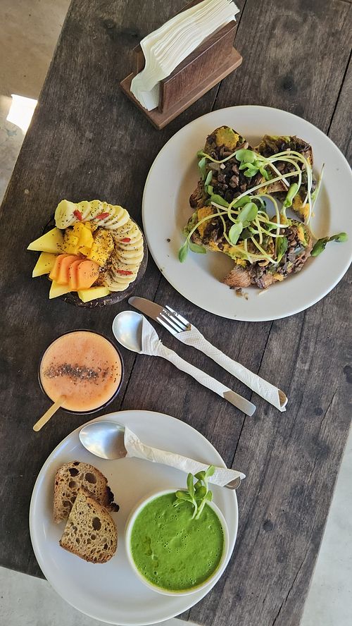 Smoothie bowl, juice and mushroom toast at Raw Love Cafe  in Quintana Roo