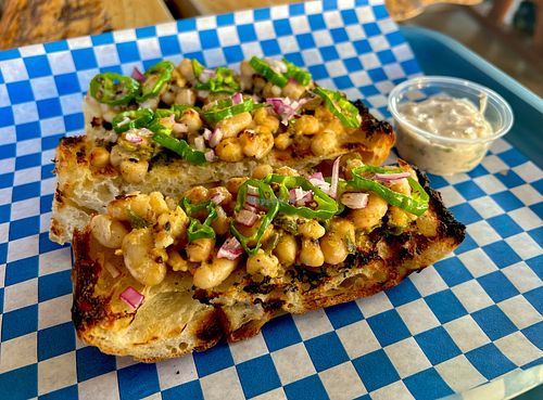 Starry sticks

 Red hen kitchen grilled
focaccia with white bean
and shishito peppers with
a creamy cilantro-lime
dipping sauce.  at Starry Bites in Eugene