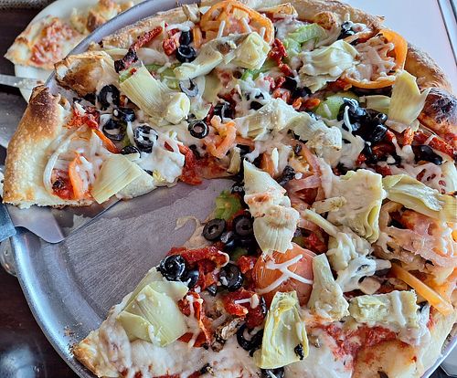 Veggie pizza with vegan cheese. at Tower of Pizza in Key Largo