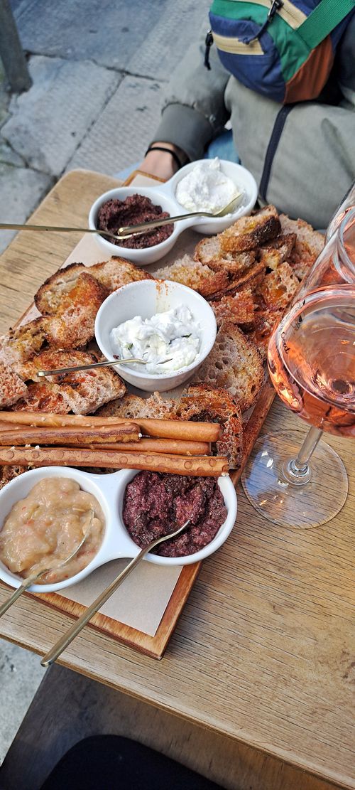 Bread with olive paste, tzatsiki, feta and smoked eggplant souce at Drunky Goat in Athens