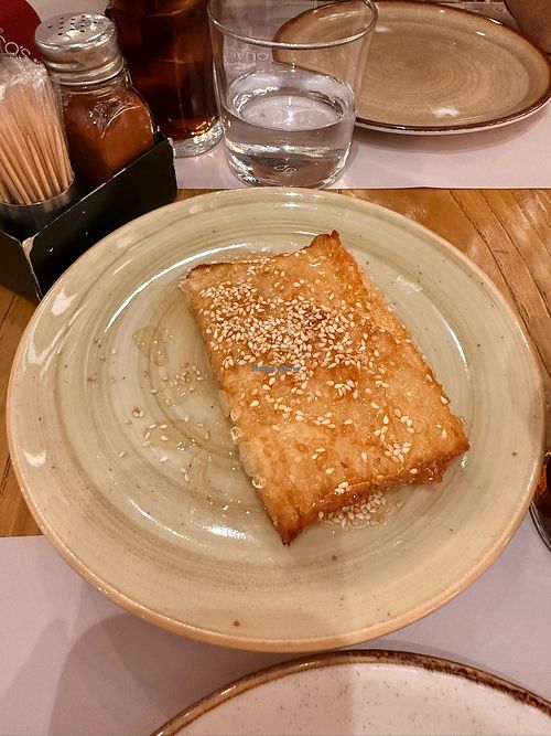 Fried Feta Cheese in Dough Pastry with Honey and Sesame (Vegetarian) at The Greco's Project  in Athens