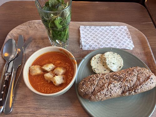 Tomatensoep met plantaardige kruidenboter  at La Place in Muiden