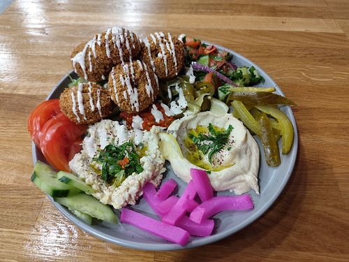 Falafel and hummus plate, with lots of salad. Big portion sizes. at Falafel House in Brighton And Hove