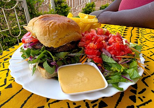 Garvey Burger platter. Tasty salad dressing. at Soul Vegetarian Kitisuru Branch  in Nairobi