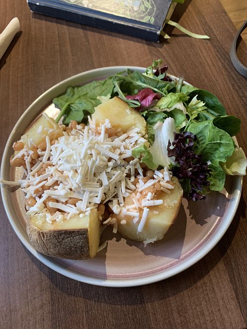 Baked potato w/ vegan cheese, beans & salad  at Arts Picturehouse Cafe in Cambridge