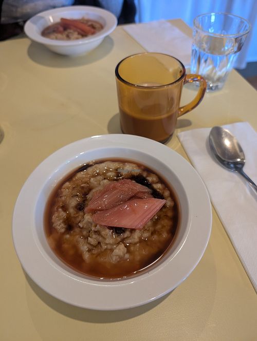 Oat porridge with brown sugar and poached rhubarb at Norah in Edinburgh