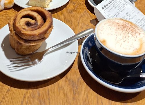 Vegan cappuccino and vegan cinnamon bun at Waterstones in Leeds