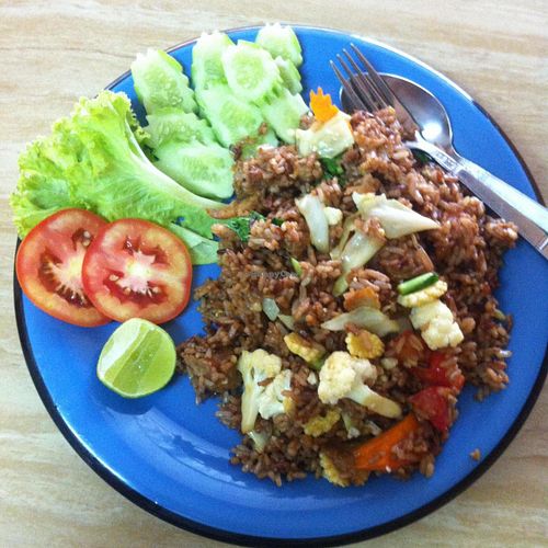 Vegetarian fried rice with tomatoes, mushrooms, Chinese parsley,  soy protein and brown rice. Best vegetarian fried rice I've ever tasted!!! at Mea Nuu Vegetarian Food in Pattaya