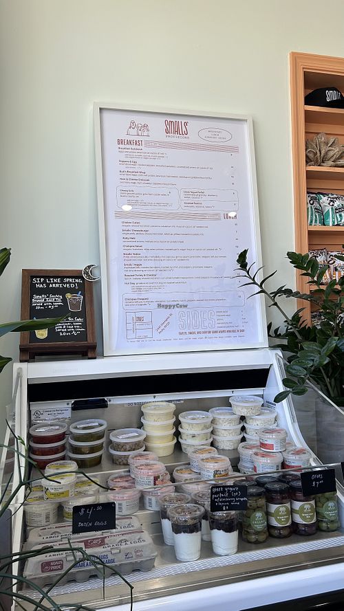 Menu and cold case in the store  at Smalls' Provisions in Philadelphia