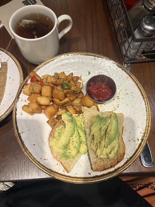 Avocado toast and breakfast potatoes  at PDX - Henry's Tavern in Portland