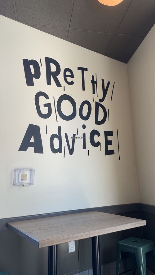 logo on wall  at Pretty Good Advice in San Jose