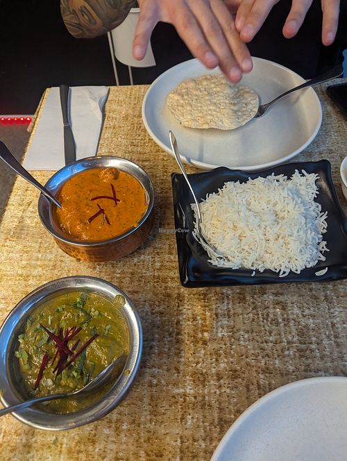 Vegan butter chicken and chicken saag at GunPowder Indian Restaurant & Bar in Christchurch