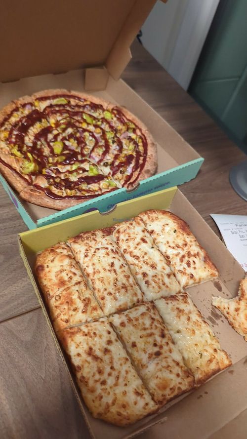 Small plant based BBQ pizza and plant based cheesy bread at Panago Pizza in Vancouver