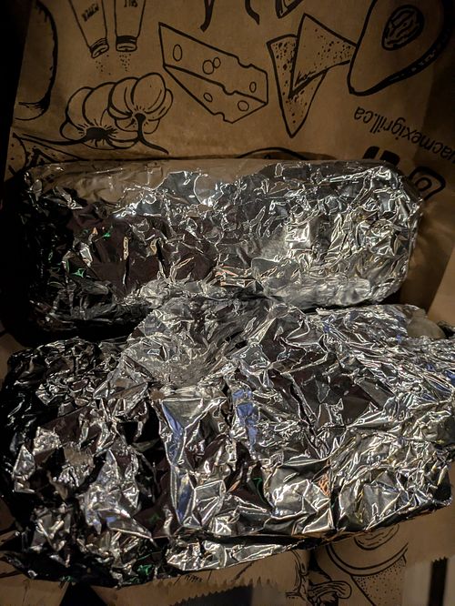 Size small on top, regular below. at Guac Mexi Grill in Ottawa