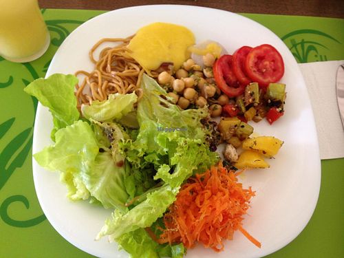 Some of the vegan salad options on a Sunday buffet: yakisoba pasta, tabbouleh, lettuce, yams with orange cream, mandioquinha's cream, tomatoes with alfalfa, chickpeas, zucchini with tomatoes and peppers. at Villa Natural in Santo Andre