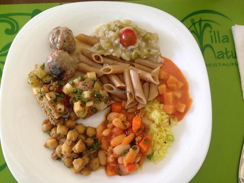 Some of the hot dishes options on a Sunday buffet: risotto, soy meatballs with chia, whole pasta, zucchini with cinnamon, veggie cassoulet, rice with nuts, palm with soy cream, chickpeas' dahl, vegetable pie. at Villa Natural in Santo Andre