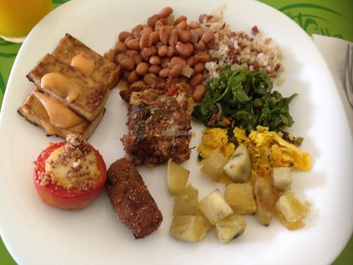 Few vegan options on Saturday: rice, beans, braised cabbage, glam, roasted sweet potato, tofu with dried tomato dressing, tomato with ''tofupiry'', healthy baked pie. at Villa Natural in Santo Andre