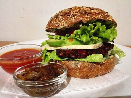 The best vegan burger in town! Slowly fermented sourdough bun, 2 types of treenut cheese, homemade ketchup, homemade mustard, caramelized onions and patty made of beet, lentils and brown rice make this buddy a real 'slow food' masterpiece! at Soma Vital Food in Sofia