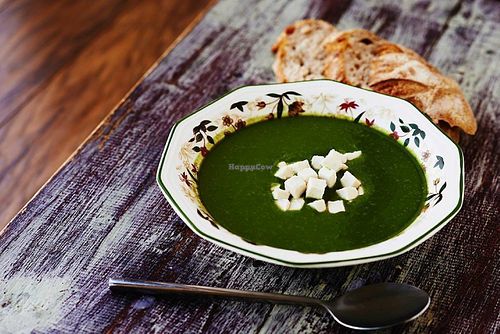 Tasty fresh spinach creamy soup with cashew cheese at Soma Vital Food in Sofia