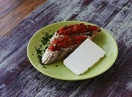 Homemade lyutenitza(traditional bulgarian starter) with naturally fermented probiotic cashew cheese and homemade sourdough bread. at Soma Vital Food in Sofia