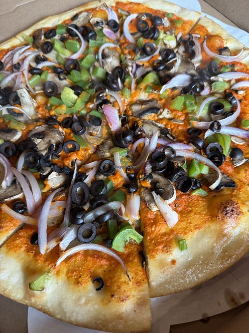 Super Yum Vegan Pizza!  at Mezza Luna Pizzeria in Eugene