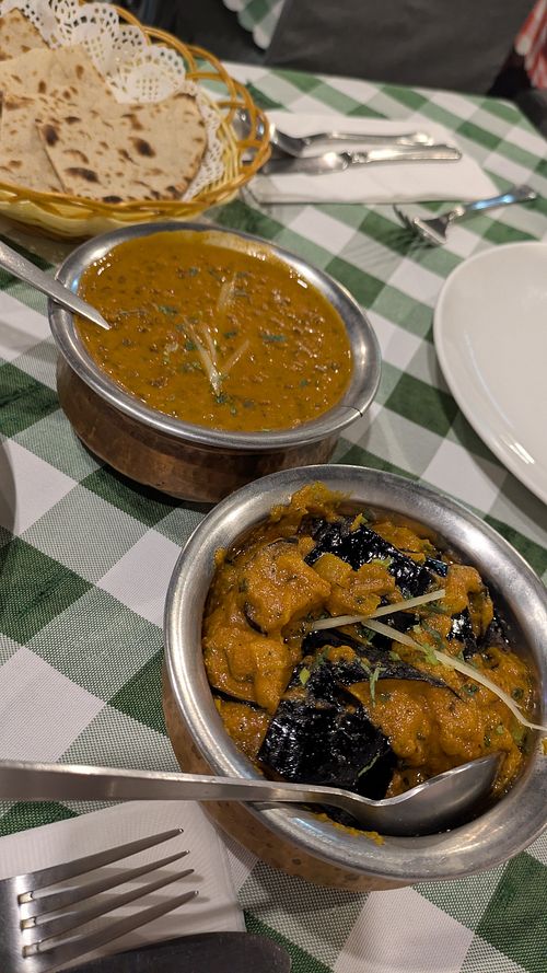 Black lentil curry + aubergine curry at Handi Indian Restaurant in Lantau Island