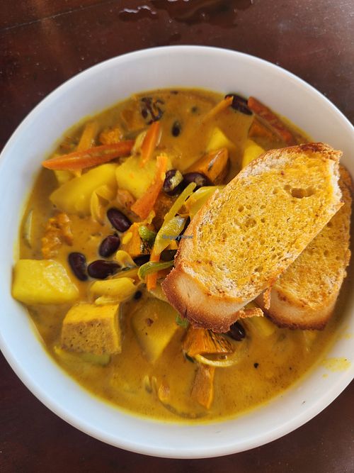 Curry with beans, potatoes, pumpkin, Tofu, coconut sauce at Frenchman's Bay Restaurant in St Elizabeth Parish