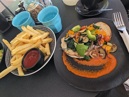 Avocado veggie bruschetta (vegan option without feta) and hot chips (ask for without chicken salt). at The Fannie Bay Coolspot in Fannie Bay