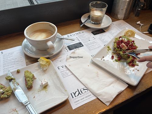 Avo on toast with beat root hummus, vegan feta and pomegranate   at Notes in Canary Wharf