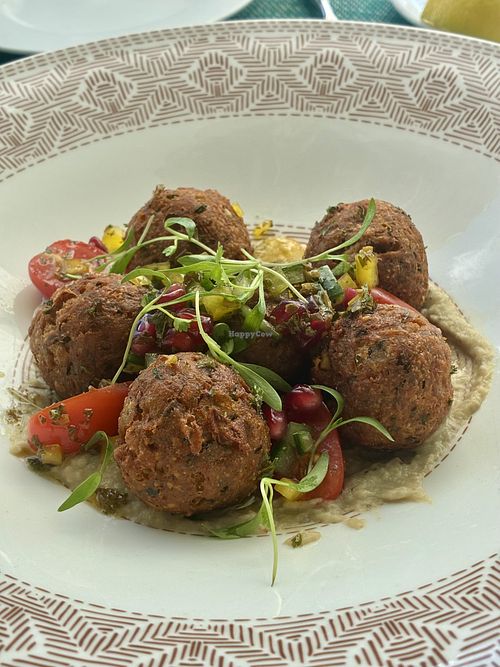 Chickpea Fritters over baba ghanoush - DELICIOUS!  at Swifty's at the Colony Palm Beach in Palm Beach