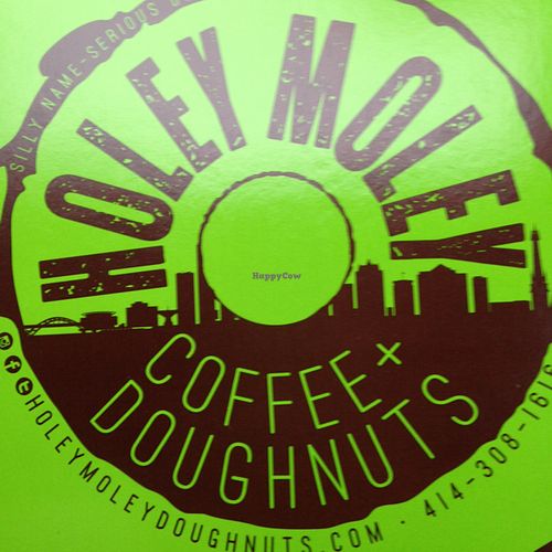 nom nom at Holey Moley Coffee and Doughnuts in Milwaukee