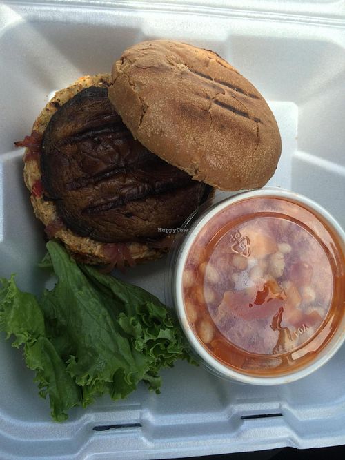 House-made vegan burger with caramelized onions and grilled portobello on a whole wheat bun. Tuscan white bean soup on the side. at Spin Cafe in Heber City