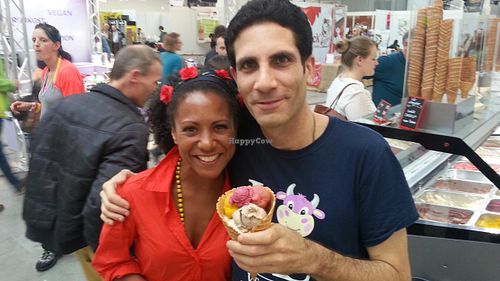HappyCow Ken enjoying a big cone of assorted flavors with Laura. at iceDate - Amalienstt in Munich