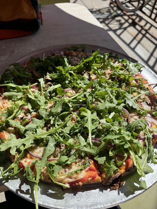 Veggie pizza with vegan cheese   at The Flying Bear Pizzeria in Naturita