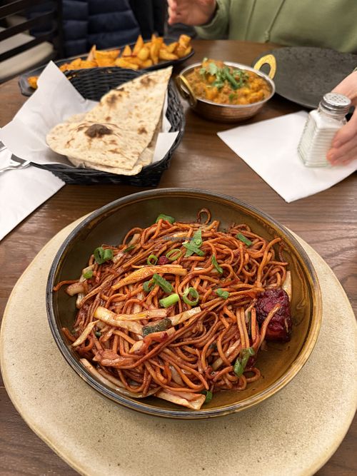 Vegan Tikka noodles, masala chips, aloo gobi, roti (no butter)  at The Hungry Elephant Bar & Grill in Coventry
