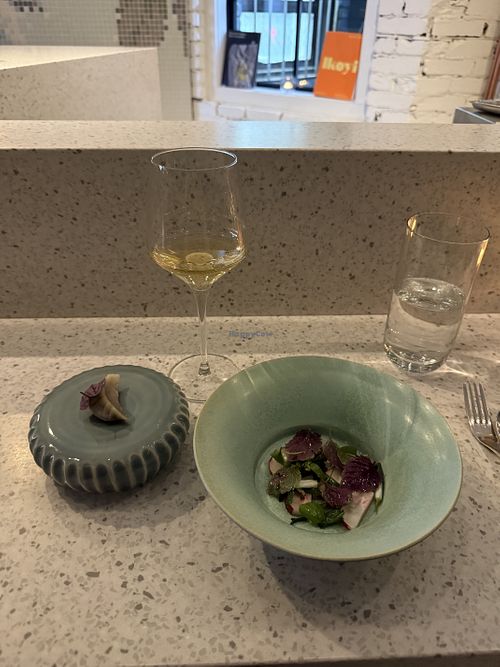 Salad and dumpling  at Ten Restaurant in Toronto