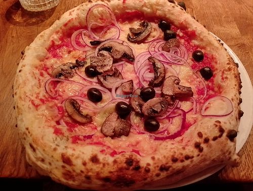 Personalised pizza - red sauce, vegan cheese, mushrooms, red onion and olives! at Crust Bros Pizza Covent Garden in London