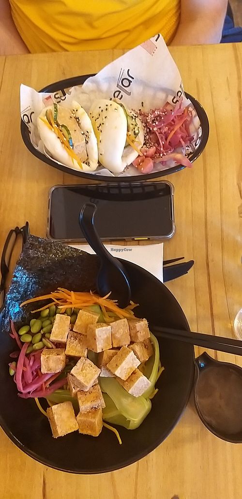 Salt and pepper tofu ramen and bao buns. Miso broth came in the little jug on the side! at Selar in Pwllheli