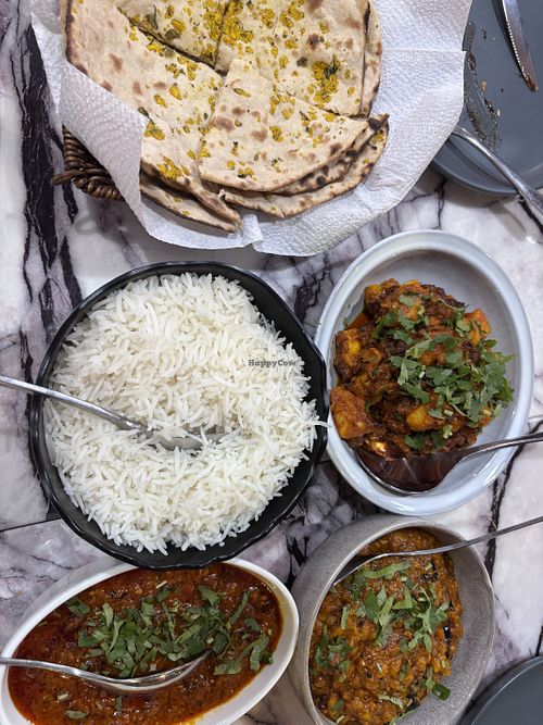 Rice, garlic roti, eggplant curry, potato/cauliflower curry and red kidney bean curry (forgotten the proper Indian names)   at The Spice Haven in Orange