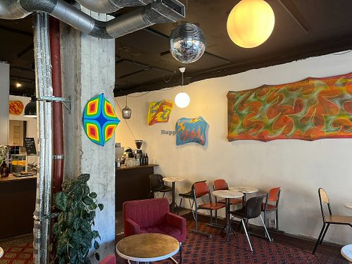 Pilkku displays interesting art on their walls and offer a decent amount of seating. at Pilkku in Helsinki