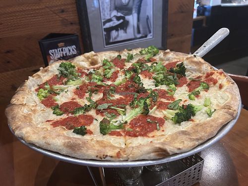 Pizza with vegan cheese at Tommys Tavern + Tap in Clifton