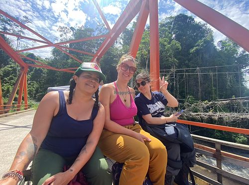 Vegan travelers enjoying the Amazon of Peru with Unruly Travel at Unruly Travel Group Trips - Asheville in Asheville