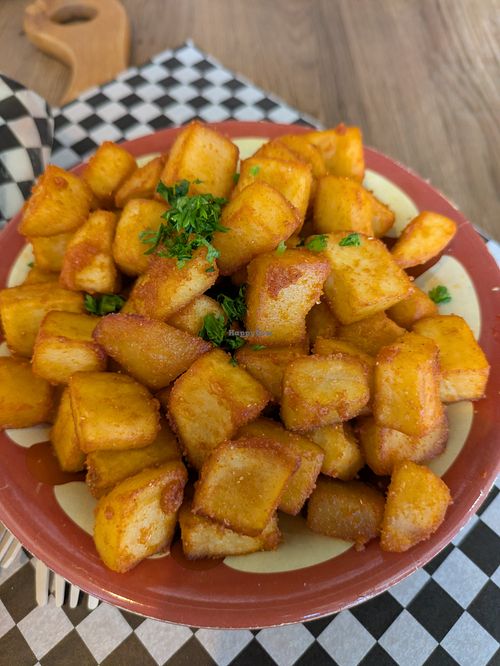 Spicy potatoes, very delicious but the bowl was constantly tipping over. at Solomon's Oven in Ottawa