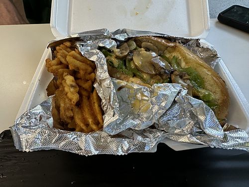 Philly Combo (steak) w/ waffle fries at Big Fat Vegan in Atlanta