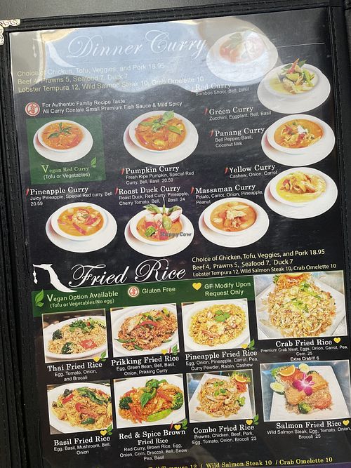 Menu showing symbol that means a vegan option is available  at Thai Wisdom Bistro Edmonds in Edmonds